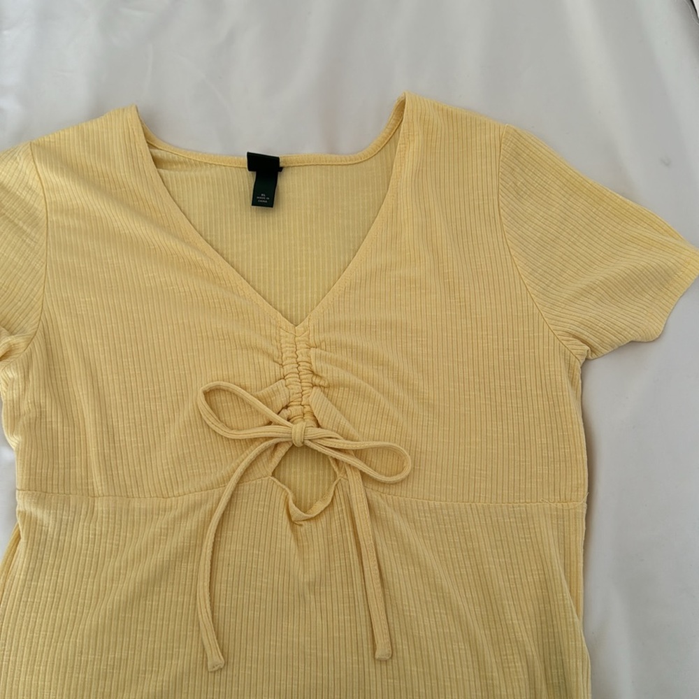 Yellow short sleeve body suit, front cut out - Picture 2 of 4
